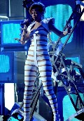 Rihanna in Stripes suit in Concert