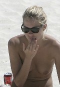 Sienna Miller nude in Topless sunbathing