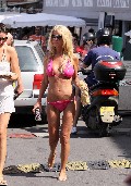 Tara Reid in purple bikini