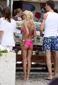 Tara Reid in purple bikini
