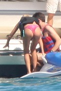 Tara Reid in purple bikini