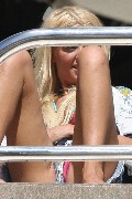 Tara Reid in purple bikini