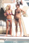 Tara Reid in purple bikini