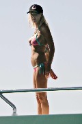 Tara Reid in purple bikini