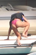 Tara Reid in purple bikini