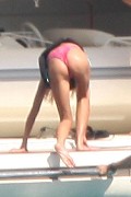 Tara Reid in purple bikini