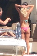 Tara Reid in purple bikini