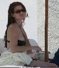 Debra Messing nude in Poolside Nip Slip