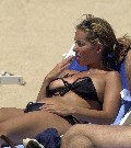 906x768, 114 KB, louise_nurding-topless_sunbathing-006.jpg