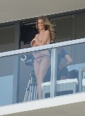 879x768, 61 KB, rosie_huntington_whiteley_topless_lingerie_shoot_03.jpg