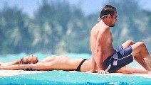 502x283, 44 KB, Toni_Garrn_goes_topless_in_Bora_Bora.jpg