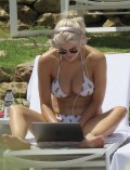 917x768, 95 KB, Ashley_James_wearing_a__bikini_around_the_pool_in_Marbella_-01.jpg