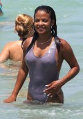 839x768, 91 KB, Christina_Milian_in_a_swimsuit_at_a_beach_in_Miami_-01.jpg
