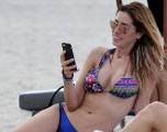 1020x768, 104 KB, Aida_Yespica_wears_a_tiny_blue_bikini_on_the_beach_in_Miami.jpg