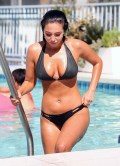 867x768, 97 KB, Tulisa_Contostavlos_in_a_bikini_poolside_in_Los_Angele.jpg