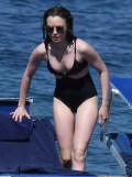 892x768, 78 KB, Lily_Collins_in_a_black_bathing_suit_in_Ischia_Porto_in_Italy-01.jpg