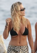 830x768, 92 KB, Rita_Ora_flashes_underboob_getting_off_of_a_boat_in_Ibiza.jpg