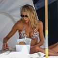 1024x768, 107 KB, Charlotte_McKinney_at_the_beach_in_a_bikini_top_in_Miami_2.jpg