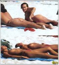 Megan Gale nude in Topless sunbathing