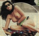 Luisa Corna nude in Topless sunbathing