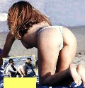 Adriana Volpe nude in Putting on a good show on the beach.