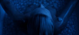 Charlize Theron nude in Atomic Blonde