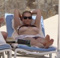 Chelsea Handler nude in Topless sunbathing