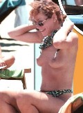 Elena Sofia Ricci nude in Topless sunbathing