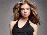Ellen Muth in black dress