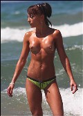 Gabriella Irimia nude in topless at the beach