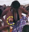 Isabella Ferrari nude in Topless sunbathing