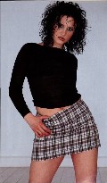 Jayne Middlemiss in miniskirt