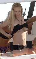 Karen Mulder nude in topless on a yacht