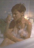 Kari Wuhrer nude in Kate's Addiction