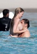 Lara Stone nude in Topless swimming