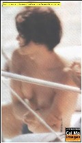 Lorenza Mario nude in topless on a yacht