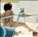 Lorenza Mario nude in topless on a yacht