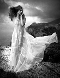 Malgosia Bela nude in topless photoshoot