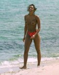 Melanie Brown nude in Topless swimming