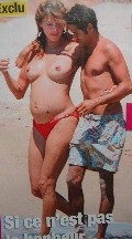Melissa Theuriau nude in topless at the beach
