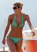 Michelle Hunziker in green bikini