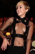 Miley Cyrus nude in Nip slip