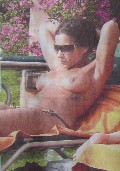 Nadja Benaissa nude in Topless sunbathing