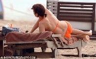 Natalie Imbruglia in orange bikini