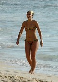 Nelly Furtado in bikini at the beach
