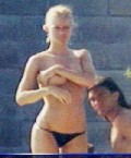 Nicole Neumann nude in Topless sunbathing