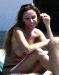 Ombretta Cantarelli nude in Topless sunbathing