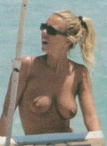 Paola Perego nude in Topless sunbathing