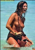 Rosy Dilettuso nude in Topless swimming