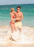 Sara Paxton in red bikini